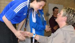 Andrea Strachan receiving her fourth gold medal of the games