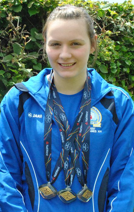 Golden girl Andrea Strachan with three of her four gold medals.