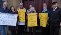 Pensionors protesting against the proposed closure of the Freefield Centre outside Lerwick town hall on the day of budget cuts, last month - Photo: Pete Bevington