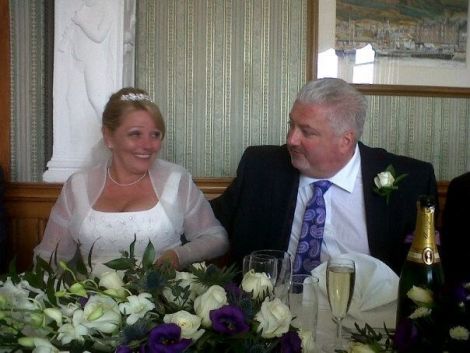 Former SIC chief executive Dave Clark and his wife Judith on their wedding day in April