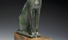 This is not a pet looking for attention but a god: watching us.