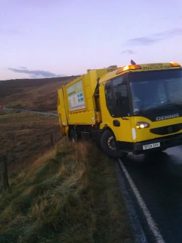 An essy kert slipped precariously off the road at Skellister. Pic. Anon