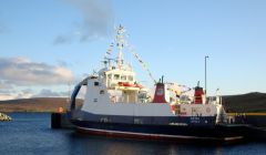 The ferry Geira festooned with flags for Saturday's opening ceremony, but will it be allowed to stay? Pic. Fetlar Developments Ltd
