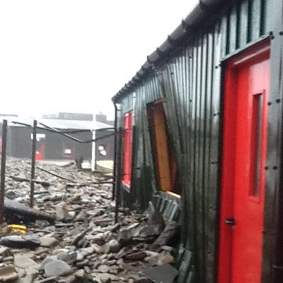 Damage to the boat shed that stores the Sandsayre interpretive centre. Pic. Helen Smith, BBC Shetland