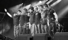 The Revellers on stage, with guitarist Andrew Clubb on the left