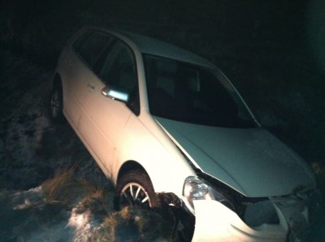 A crashed VW Polo lies in a ditch near the Halfway House after coming off the road on Tuesday evening. Photo Shetland News