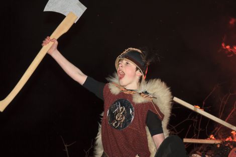 Guizer Jarl Murray Peterson in front of burning galley - Photos: Olivia Abbott