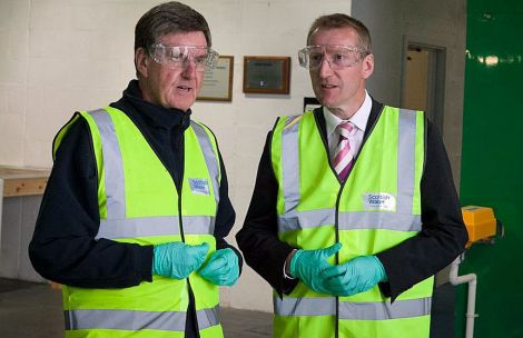 Isles MSP Tavish Scott with Scottish Water chairman Ronnie Mercer in Shetland. Photo Scottish Water