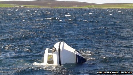 The semi-submerged Lady K drifts in Eday Sound on Friday morning. Photo RNLI