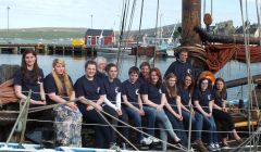 Ten of the 14 teenagers going on two exciting sailing trips this summer are (from left to right): Eve Maguire; Laura Hampton; Emma Cockerill; Valerie Robinson; Steven Anderson; Georgia Leask; Molly Brindley; Diana Inkster; Kate Tyler and Ailish Parham. With them are (back row): Sail Training Shetland chairman Peter Campbell, Swan skipper Richard Pattison and bosun Scott Sandison. Missing from the photo are: Orren Holt; Michaela Peterson; Heather Gray and Thomas Meadows.