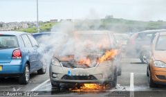 Hot, hot, hot! Photographer Austin Taylor captured this Kia on fire at Tesco car park just before the fire brigade arrived.