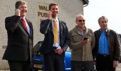 Getting connected in Walls (from left to right): isles MP Alistair Carmichael, John McCracken of Vodafone, as well as Doug Forrest and Ian Walterson of the Sandness and Walls Community Council - Photo: Olivia Abbott/ShetNews