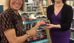 Orkney poet Morag MacInness with library executive manager Karen Fraser.