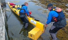 Launching the double sea kayak Larsen.