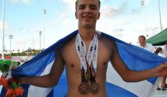 Felix Gifford with the gold and silver medals he won on Tuesday night.