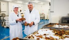 HIE’s Elaine Jamieson and Blueshell’s managing director Michael Laurenson sample some of the fresh crab delivered to the new plant. – Photo: John Coutts for HIE