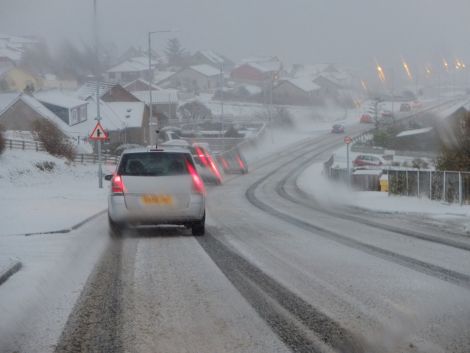 Drive carefully! Several vehicles have come a cropper in the first snow of the season as they drive to work. Photo Chris Brown
