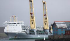 The port has seen some large vessels arriving during 2013. Pictured is the heavy lift cargo vessel Lone arriving with modules for the Shetland Gas Plant in November last year - Photo: Ian Leask
