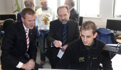 Shetland MSP Tavish Scott, the Met Office's chief government adviser for Scotland and Northern Ireland, Alex Hill, and radiosonde operator Owen Barton monitoring the data transmitted from the weather balloon launched earlier in the day - Photo: Hans J Marter/ShetNews