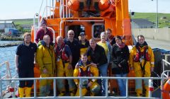 Jan Livingstone joins the Aith lifeboat crew to complete one of her 70 challenges on Tuesday.