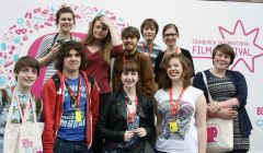 Young film maker Jenny Brown (centre front), flanked by four other new members of Maddrim Media during an exchange with SKAMM in Edinburgh last month. To Jenny's left are Eve Christie and Logan Nicolson, and to her right are Joanne Tait and Freya Stout. behind her are five members of SKAMM. Photo Maddrim Media