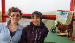 UWC Short Course project coordinator Undine Schmidt with Bethany Scott in Bobby's Bus Shelter at Baltasound.
