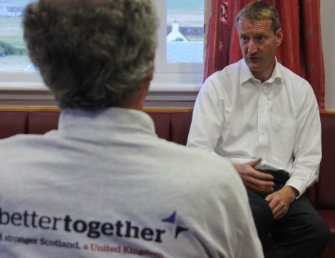 Tavish addresses Wednesday night's meeting at Hillswick public hall. Photo Shetnews