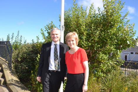 Deputy first minister Nicola Sturgeon, with SNP list MSP Mike Mackenzie, outside Islesburgh on Wednesday morning. Photo: Shetnews