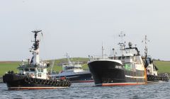 Danish trawler Karbak being towed into Lerwick on Sunday. Photo: Ian Leask