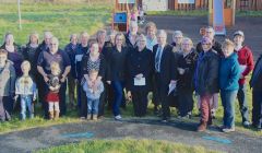 Mike MacKenzie meeting the Urafirth community at the weekend. He wants school closures taken off the agenda for five years. Photo: Shetnews