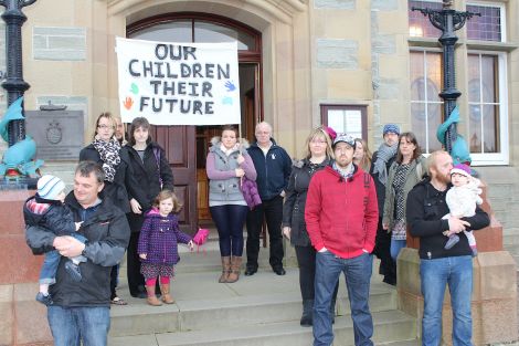 Urafirth parents outside Lerwick Town Hall on Wednesday morning. Photo: Shetnews/Hans Marter
