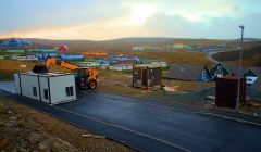 This portacabin at Staney Hill, in Lerwick, was unable to stand the strength of the wind on Monday afternoon. A JCB Loadall is keeping it from going any further - Photo: Nate Bryant