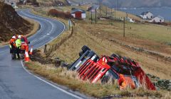 The Garriock Brothers low loader lying off the road down the embankment at Levenwick on Tuesday morning Photo Ronnie Robertson