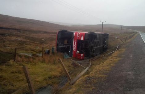 An Andrew's Adventure bus by the roadside. No-one was hurt. Photo: Gordon Harmer