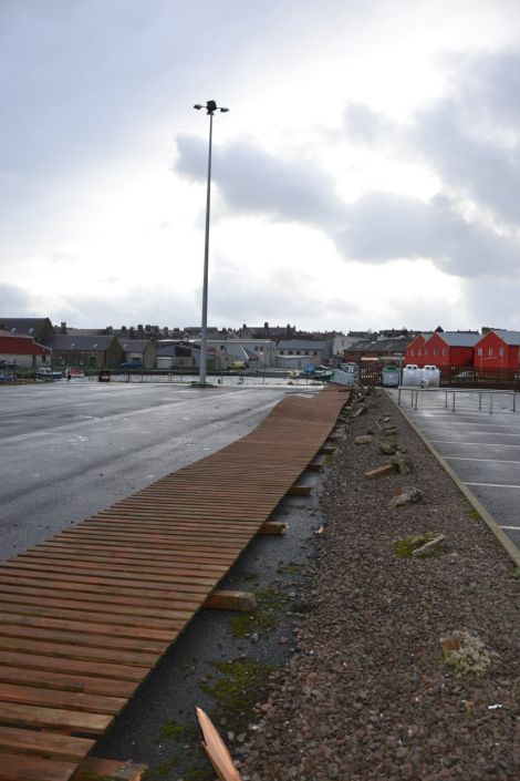 Flattened fencing at the Co-op supermarket's Lerwick car park. Photo: Shetnews