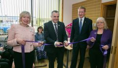 At the ribbon cutting of the new office are (left to right) Ann Williamson, Dementia Advisor, Henry Simmons - Chief Executive of Alzheimer Scotland, Tavish Scott - MSP and Heather Fisher - Chair of the Shetland Branch. - Photo: John Coutts