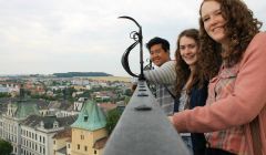 Shetland students, Kaylee Mouat (right) and Hannah Budge, with Phi-Luan Chung from Diepholz, Germany, enjoying the view from the Bata Tower in Zlin, Czech Republic at the 2014 Global Classroom Conference - Photo: SIC