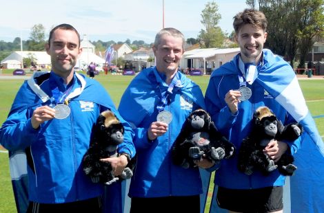 Leon Johnson, Matthew Cox and Bobby Bristow celebrating their silver medal in the team's half marathon - Photo: Maurice Staples