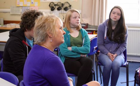 Listening intently - Fair work secretary Roseanna Cunningham in discussion with pupils Harry Bedding (partially obscured), Iona Spence and Ellie Ratter at Brae High School on Wednesday - Photos: Chris Cope/ShetNews