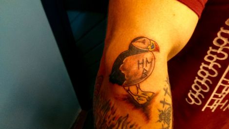 Baethos' Steven Murray shows off his new Shetland tattoo. Photo: Chris Cope/ShetNews