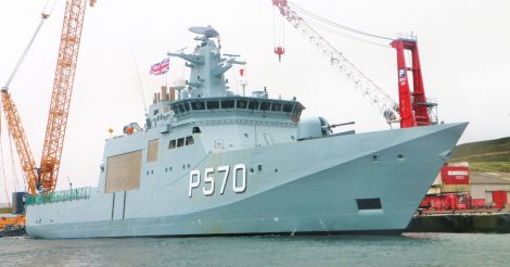 The Danish naval vessel Kind Rasmussen in Lerwick harbour for half an hour last Friday during which it collected 'Echo' from police officers before returning it to Faroe. Photo Ian Leask
