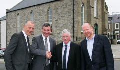 Chris Dowle, Harper MacLeod chairman Professor Lorne Crerar, Paul Rutherford and Harper MacLeod partner Donald Munro outside the DSR offices at St Olaf's Hall in Lerwick. Photo John Coutts)