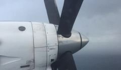 High in the sky, propellor not turning. Catherine Stihler MEP's photo of the engine shut down on board the Saab 340 as it returned to Kirkwall airport on Thursday afternoon.