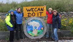 Da Wives Atween Wadders with their bruck collage of a polar bear on a shrinking iceberg. From left: Jan Bevington, Sue Hinton, Aurore Whitworth and Bunchy Casey. Photo HWS
