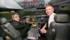 UK transport minister Robert Goodwill (left) during a visit to Flybe's trading academy in Exeter last year. This week he said he was sure Loganair flights were safe.