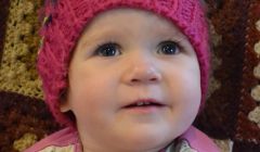 Shetland Solidarity with Refugees is urging islanders to get knitting. The group's Inger Louise Kristiansen, whose daughter Johanne (pictured) is 1, said it was a chance to "help make a pretty horrible experience a little bit more comfortable" for children living in camps this winter. Photo: Shetnews/Neil Riddell