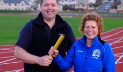 SIGA chairman Andrew Inkster hands over the baton to new chairwoman Karen Woods. Photo: SIGA