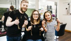 Jordan Kay and her aunt Krissi Macdonald proudly display their shorn locks with the man responsible Gary Stove from Sharp Image. Photos Ria Moncrieff