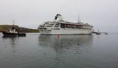 MV Gemini leaving Scalloway following a year-long stay on Tuesday morning. Photo: Saro Saravanan