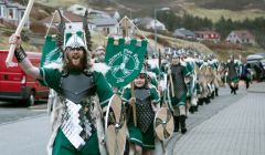 Enjoying every minute, Jarl Haakon Haraldsson leads his squad of Vikings through the streets of Scalloway on a cold but clear Friday morning. All photos Garry Sandison
